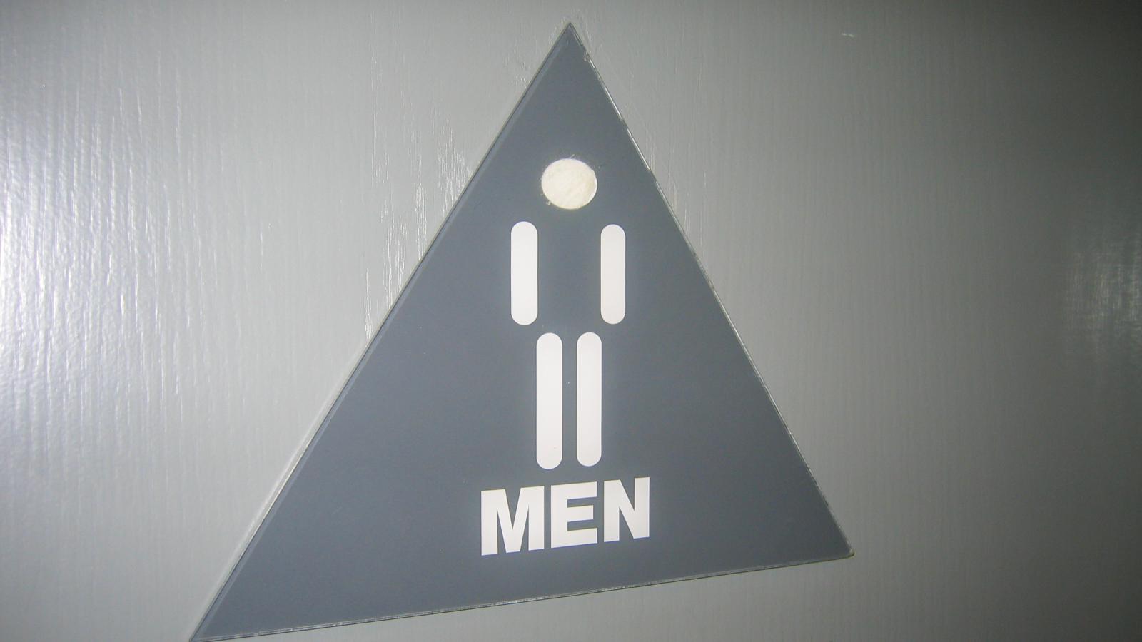 men sign toilet door