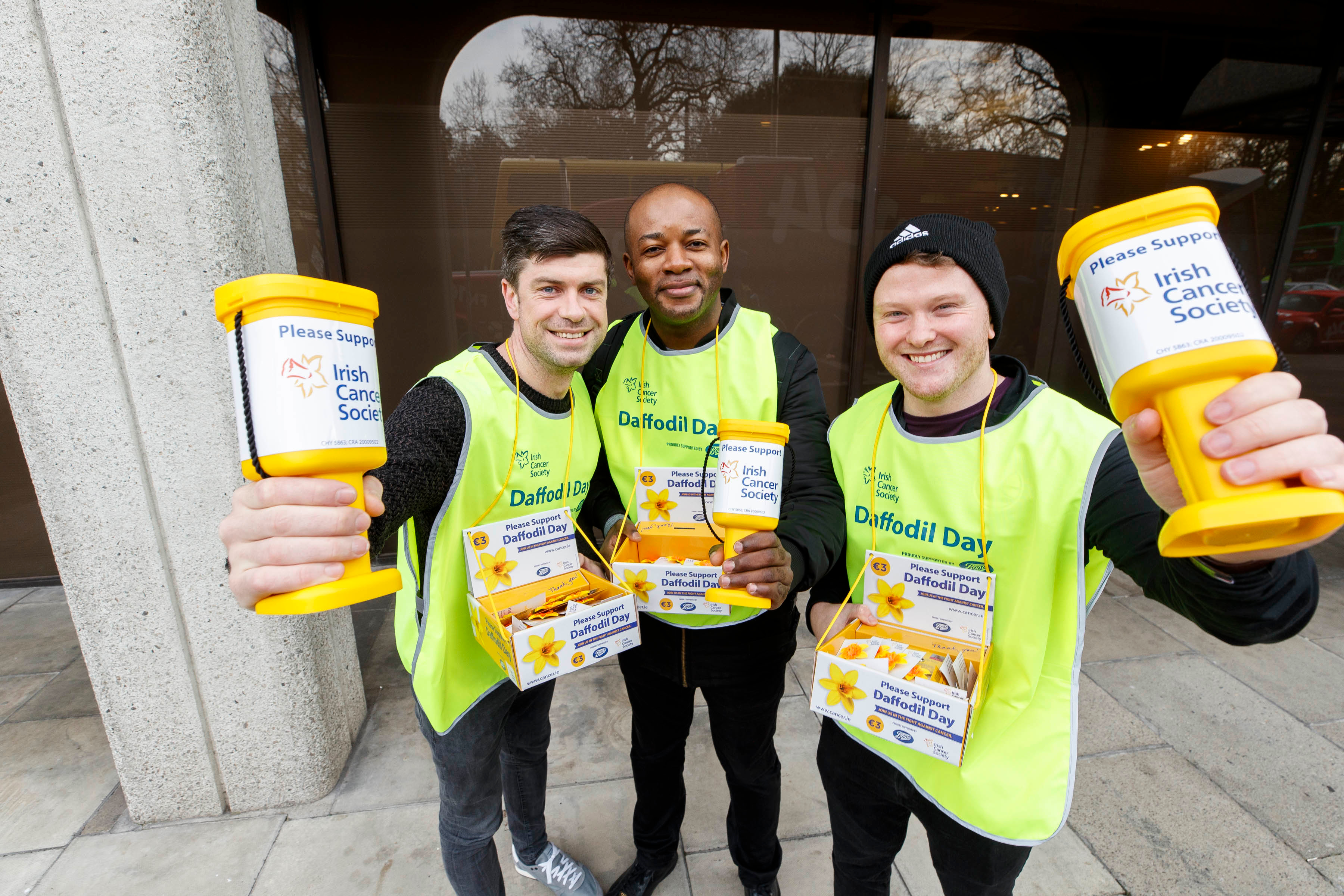 Young men with Daffodil Day collection buckets