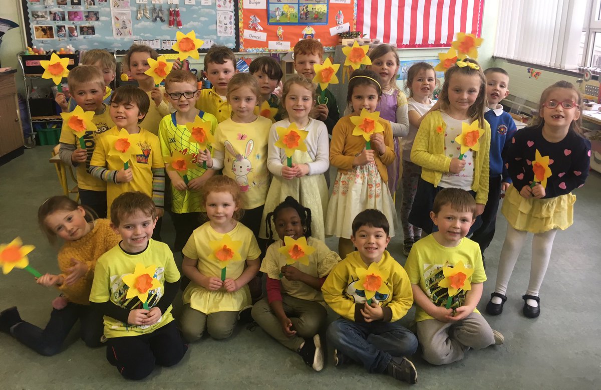 Elementary school students with daffodils