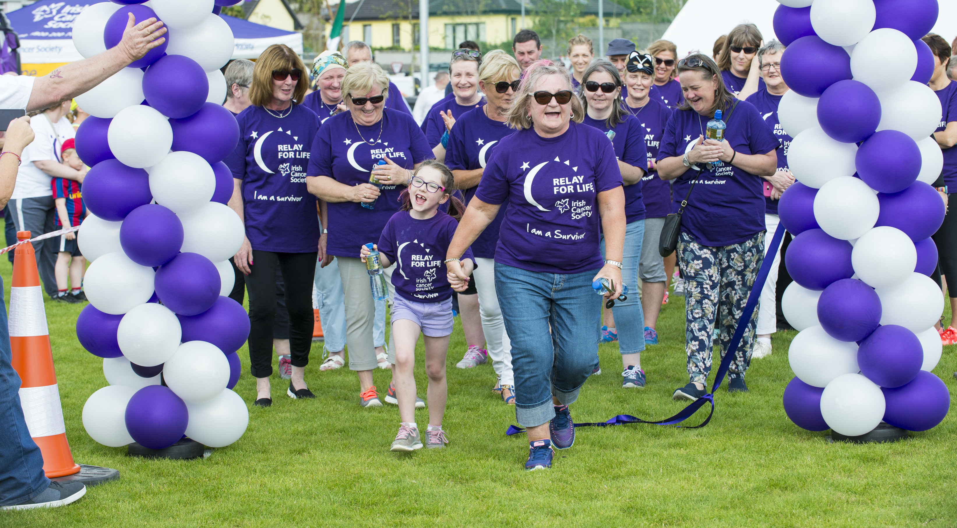 Cancer survivors walking at Relay For Life Midleton