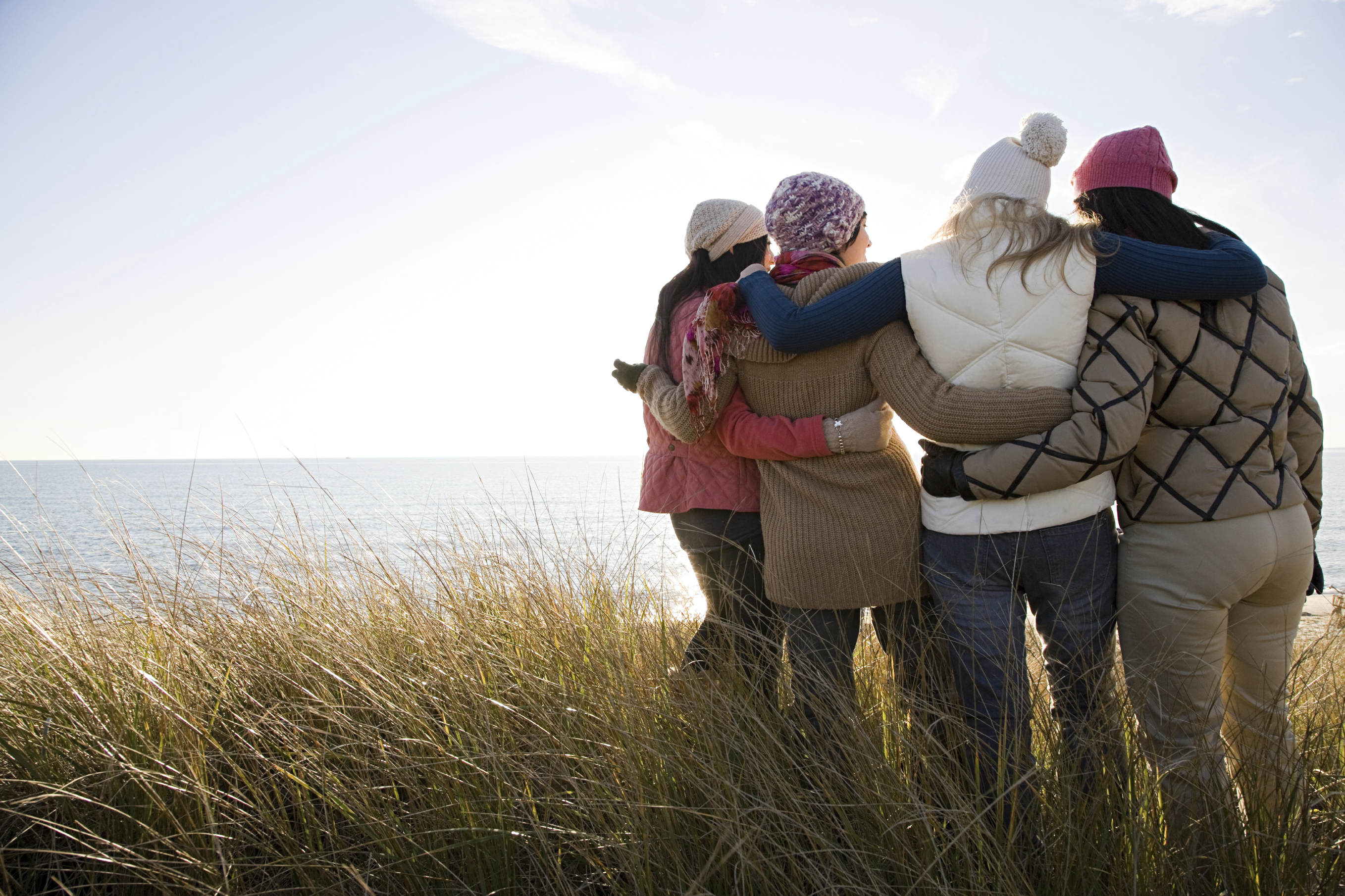 Group of friends hugging each other