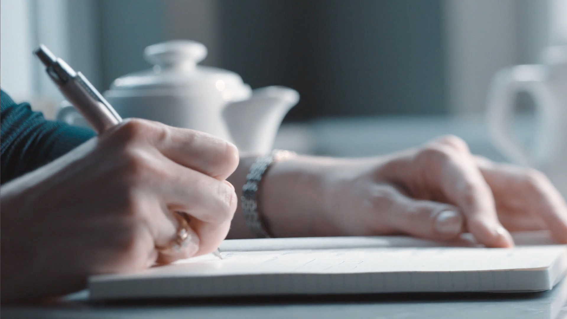Person signing their name