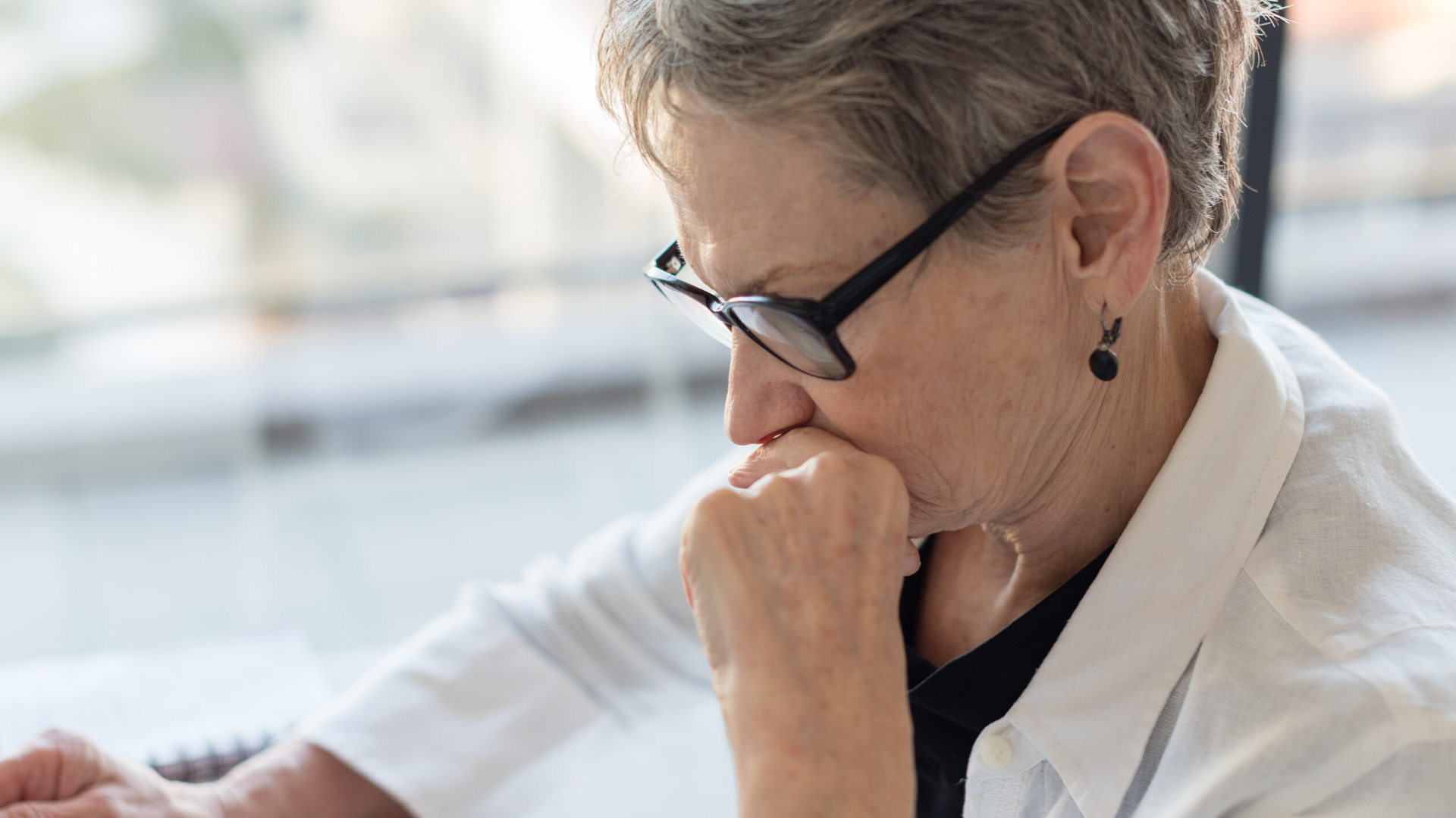 older woman looking worried
