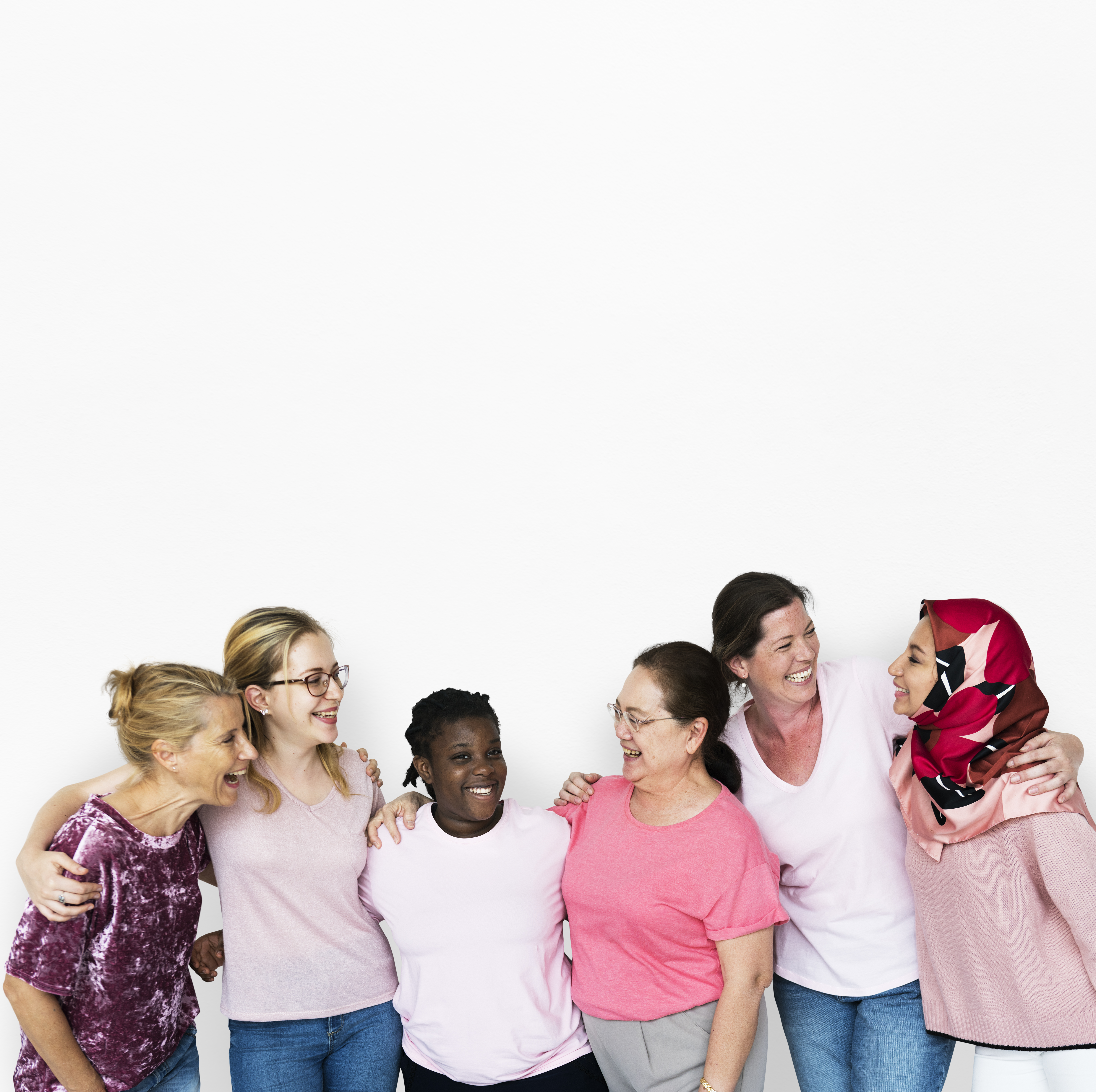 Group of women of various nationalities looking happy