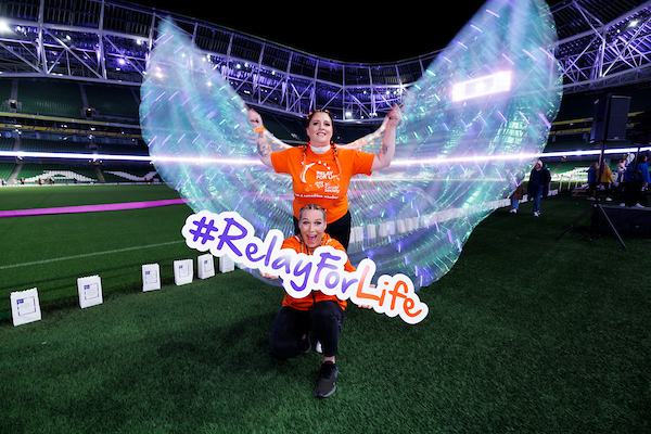 2 Relay For Life participants smile at camera