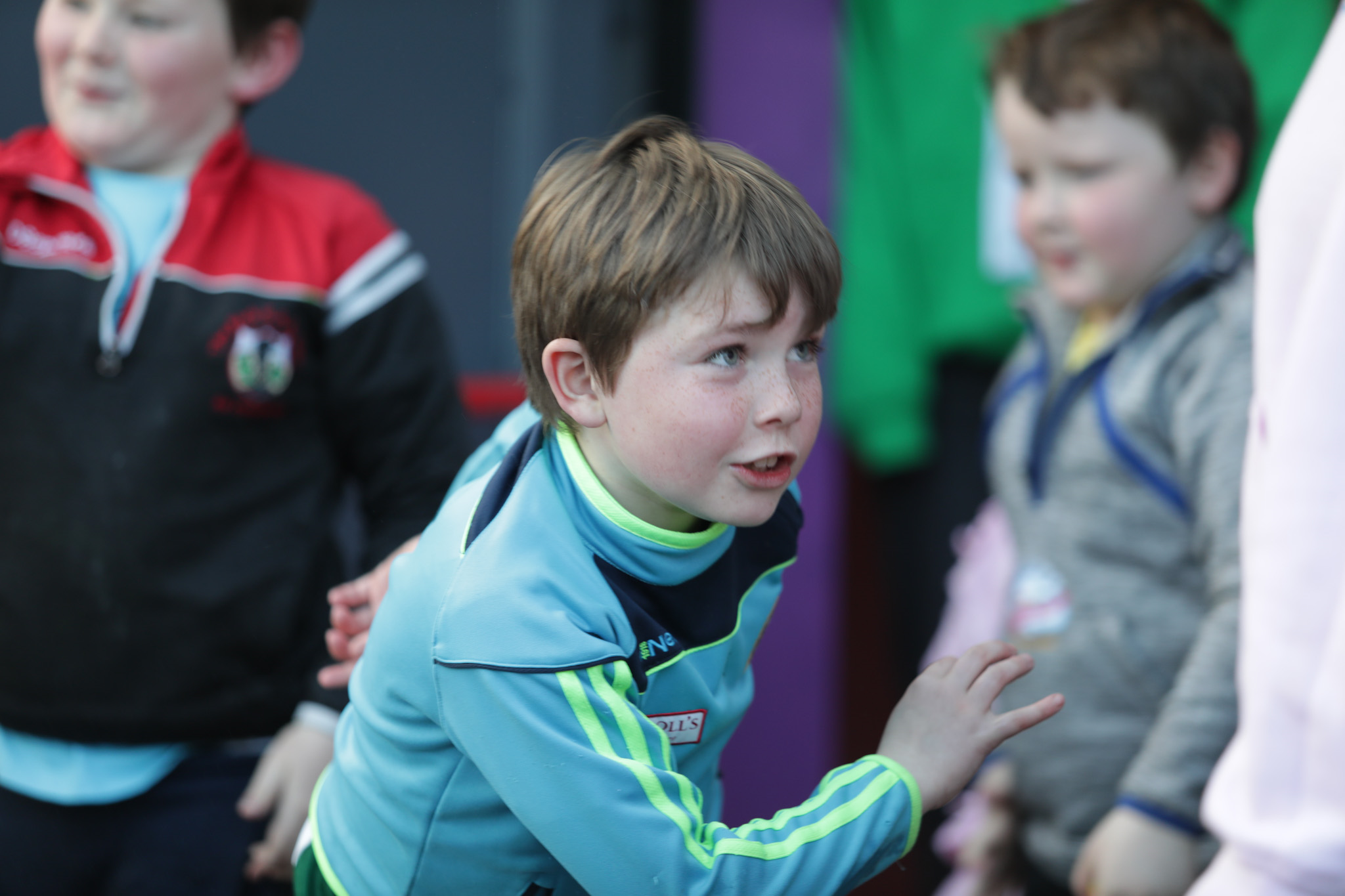 A young boy plays at camp