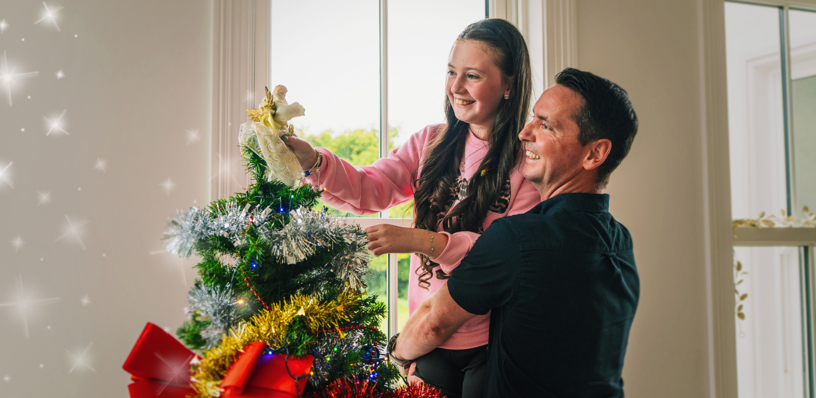 Sophia with her dad - Christmas appeal ambassador 2025 image