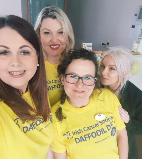 Employees at a Daffodil Day coffee morning