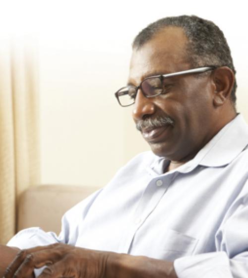 african man laptop