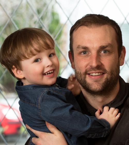 Cancer survivor Chris and his son