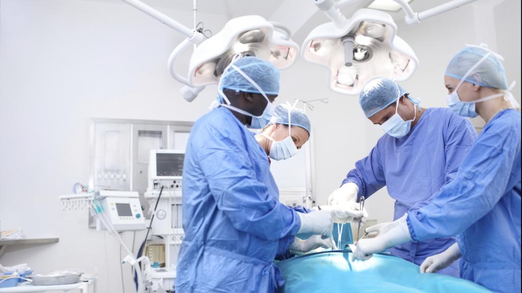 Doctors and nurses in surgery