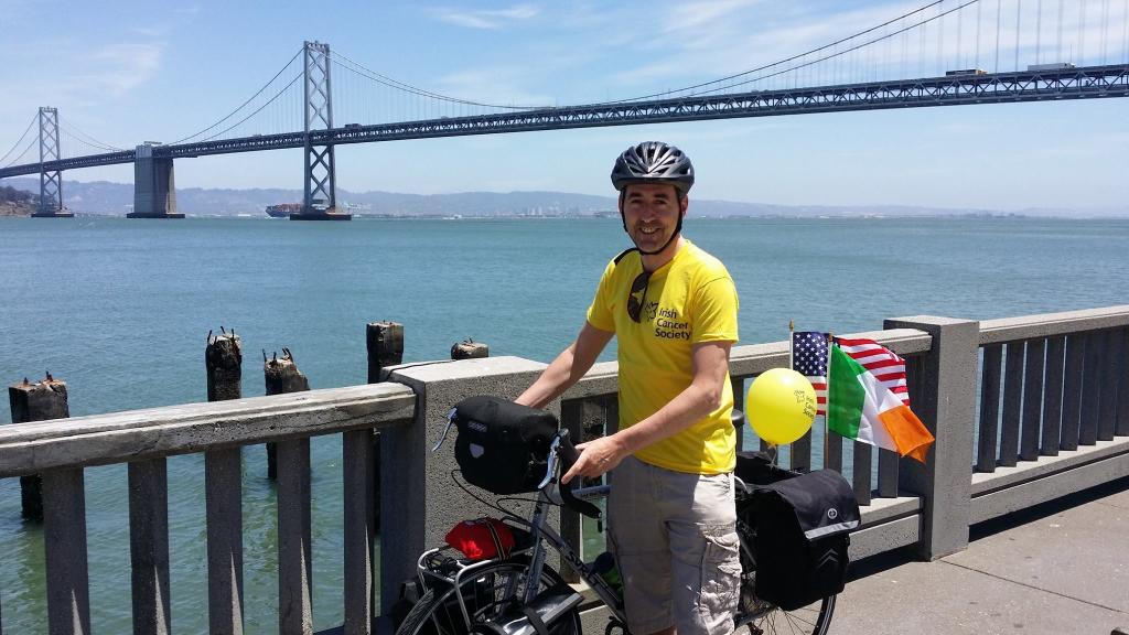 Irish Cancer Society fundraiser in yellow t-shirt
