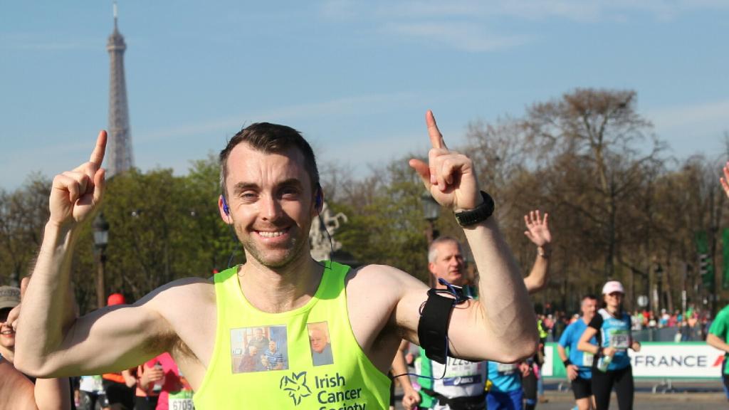 overseas marathon man running in paris