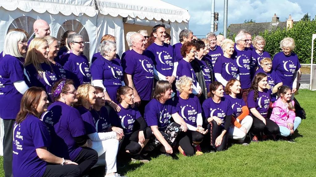 Cancer survivors in purple t-shirts at Relay For Life Offaly