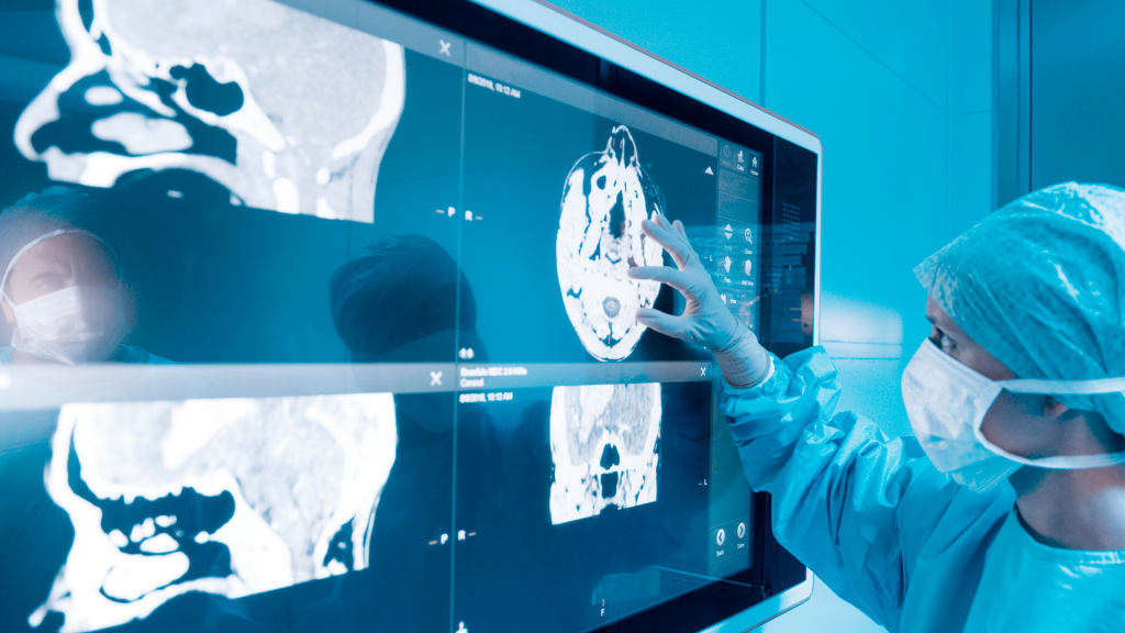doctor examining brain scans