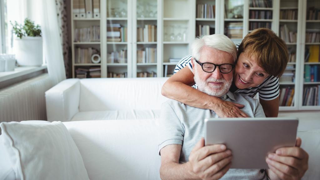 Older couple using a tablet