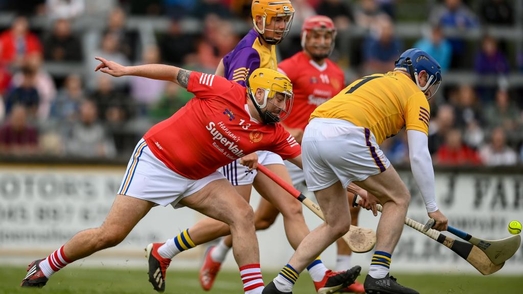 Hurlers playing at a Hurling for Cancer Research Match