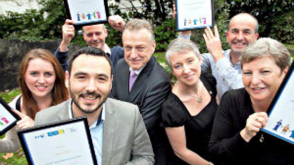Pictured is Paul Hughes(centre), Irish Cancer society Area Shops Manager and Clayre Sloan(centre) Marie Curie Area Shops Manager, Northern Ireland with from left , Niamh Breathnach, Marc Nolan, Ian Driver, Danny Barrett & Mariea Tobin celebrating the Great BT charity shops challenge 2014 from the Irish Cancer Society Shop, Bray.Photo Chris Bellew / Copyright Fennell Photography 2014