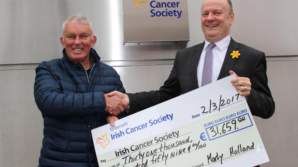 Dr Marty Holland presents the proceeds from the first leg of his Coast for Cancer challenge to Mark Mellett, Head of Fundraising, Irish Cancer Society. Dr Marty Holland presents the proceeds from the first leg of his Coast for Cancer challenge to Mark Mellett, Head of Fundraising, Irish Cancer Society.