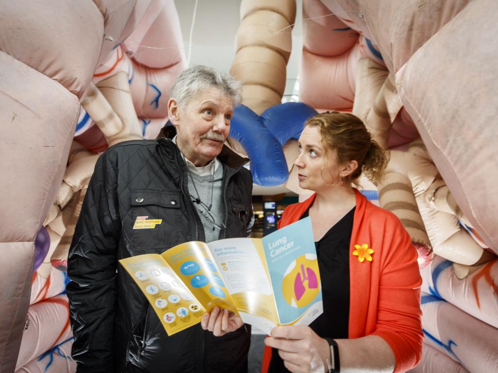 People visiting mega lungs display