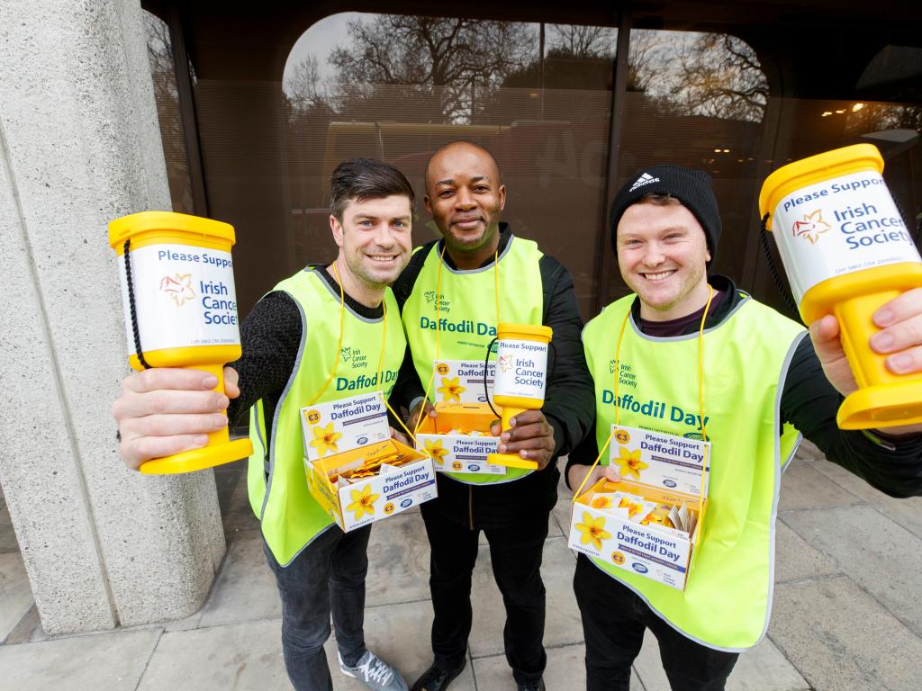 Young men with Daffodil Day collection buckets