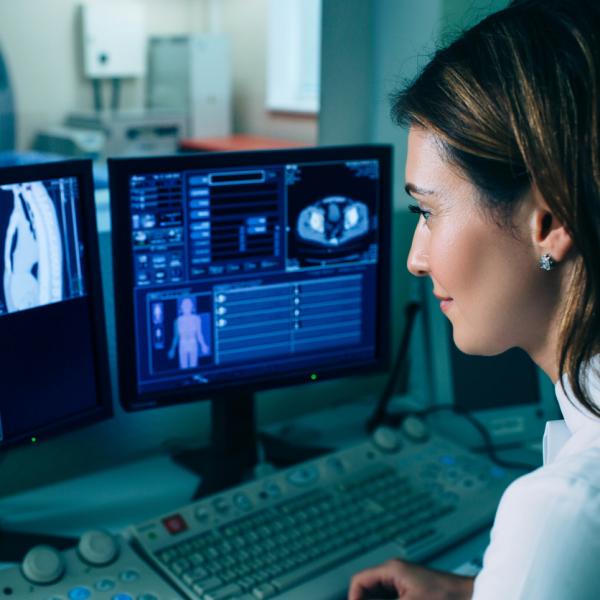 Doctor looking at x ray CT scan