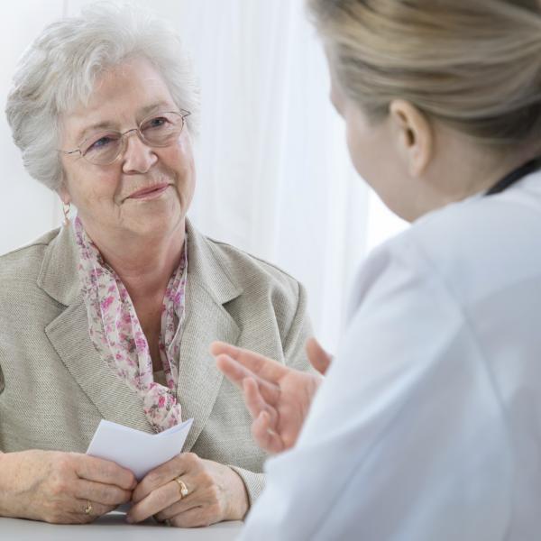Older woman talking to her doctor