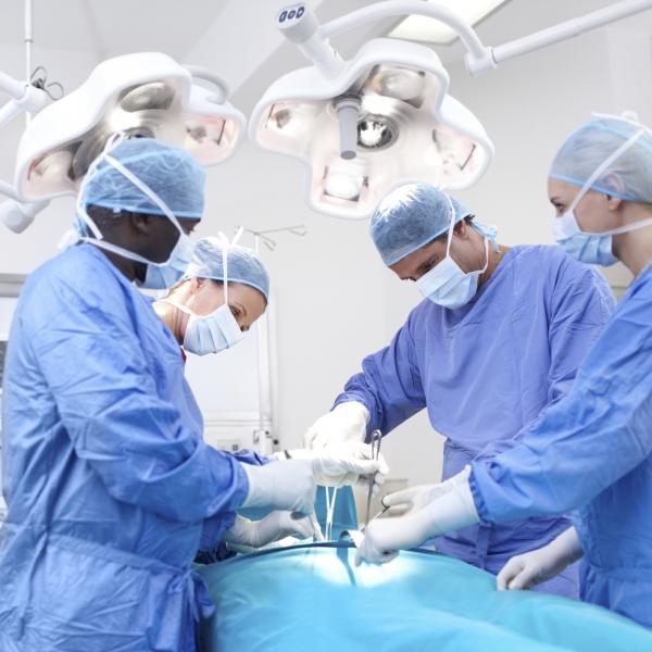 Doctors and nurses in surgery
