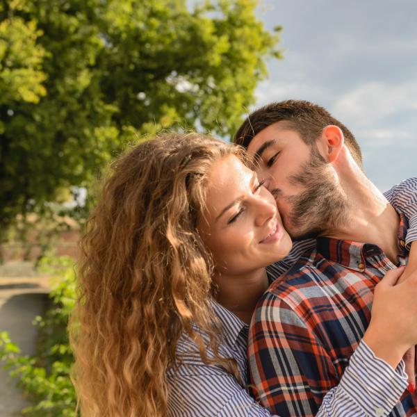 man-kissing-woman