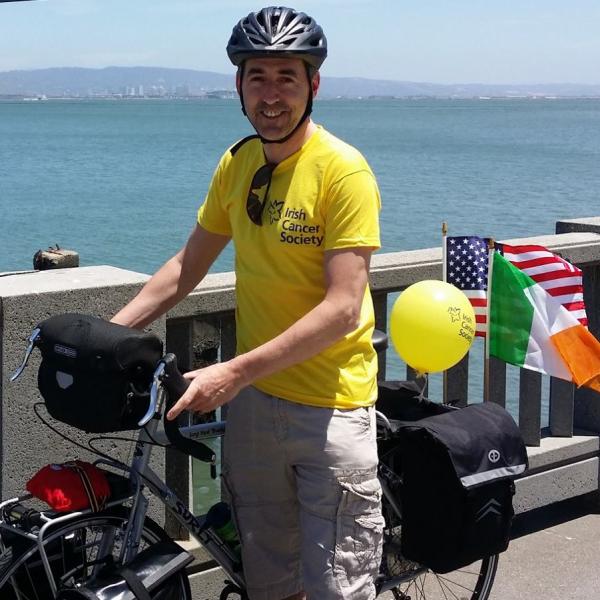 Irish Cancer Society fundraiser in yellow t-shirt