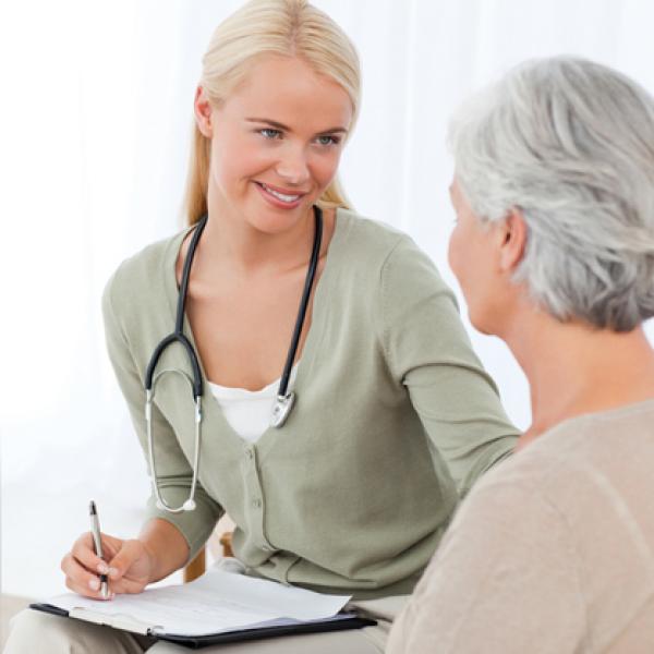 Older woman talking to a doctor