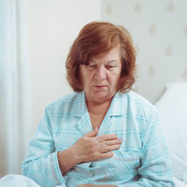 Older woman concerned at pain in her chest
