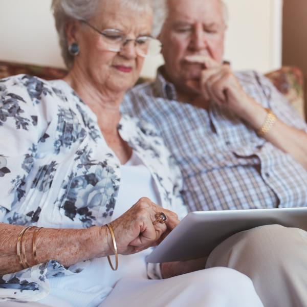 Older couple using a tablet