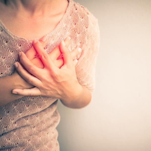 Woman feeling her breast