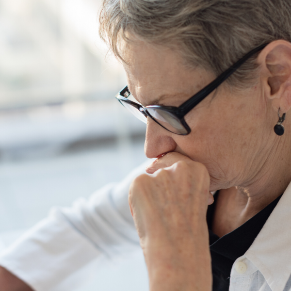 older woman looking worried