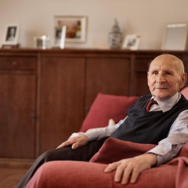elderly man home couch