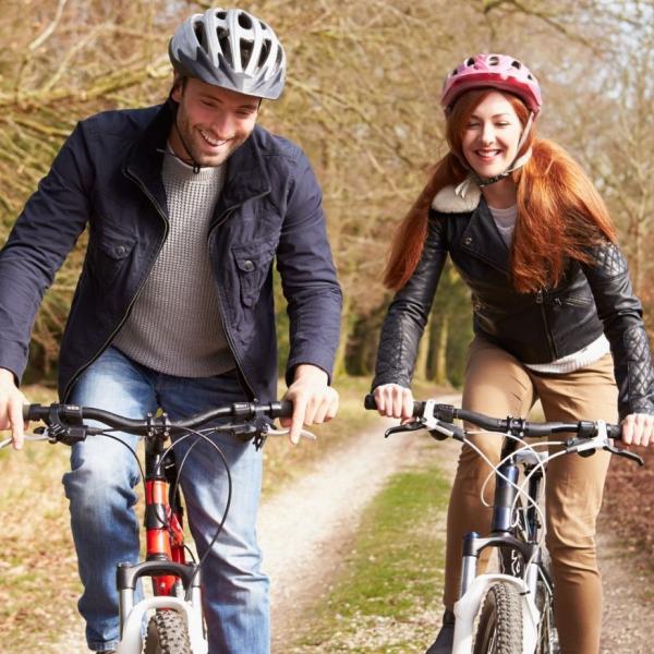 Cycle challenge - man & woman cycling bicycles