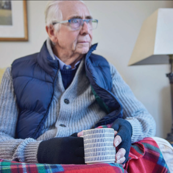 elderly man cold with tea