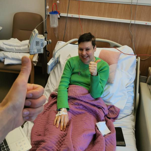 Theodora in hospital bed