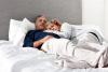 Mature couple laying in bed