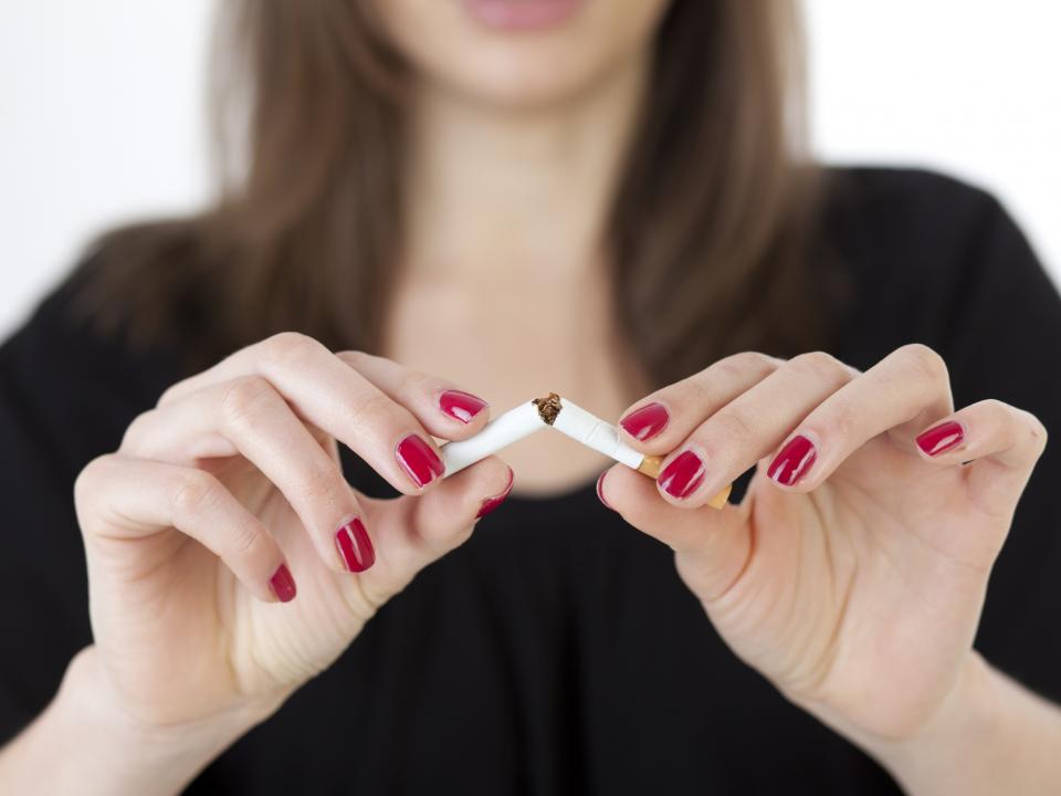 Breaking a cigarette in half