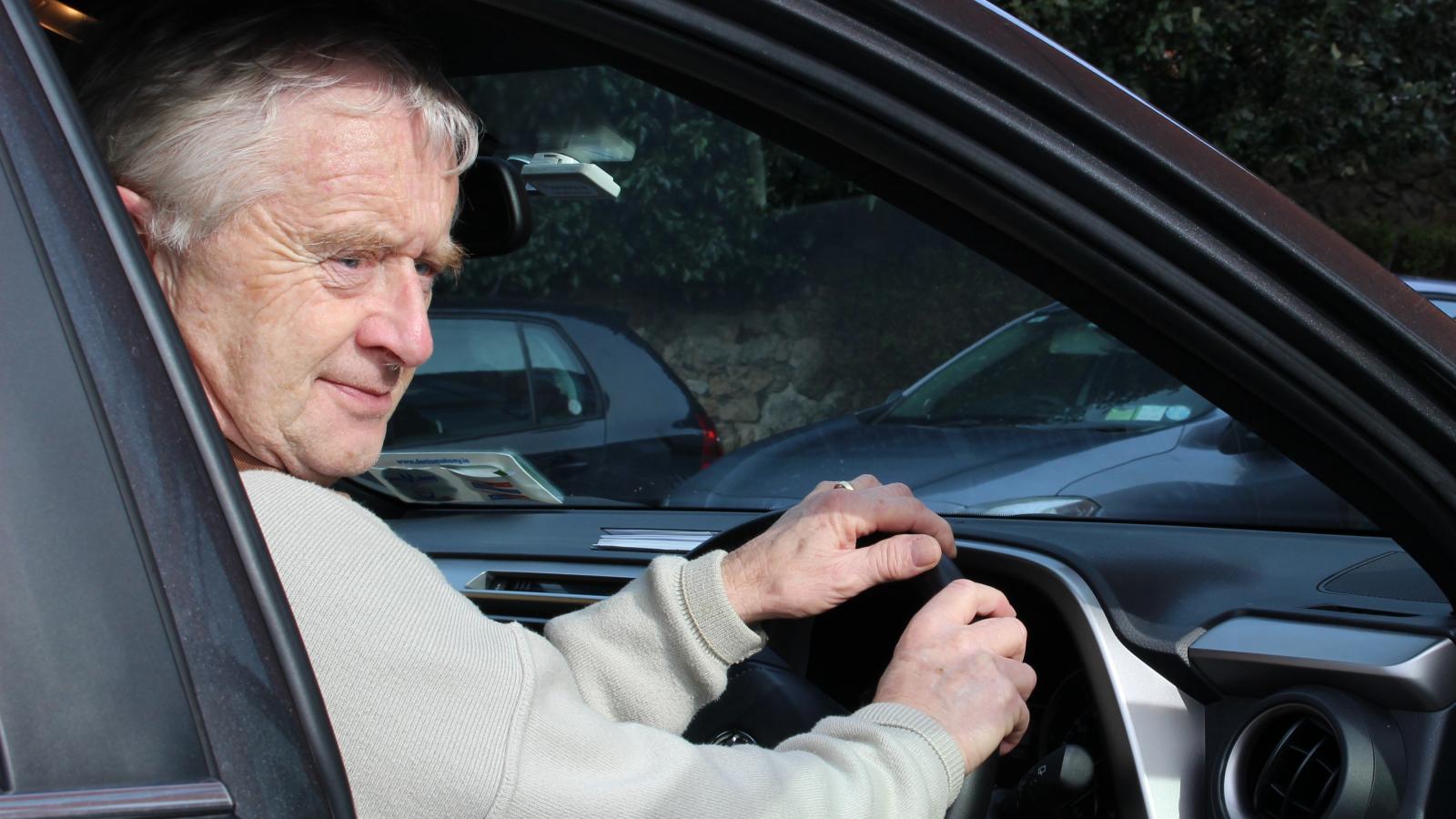 Volunteer driver in his car