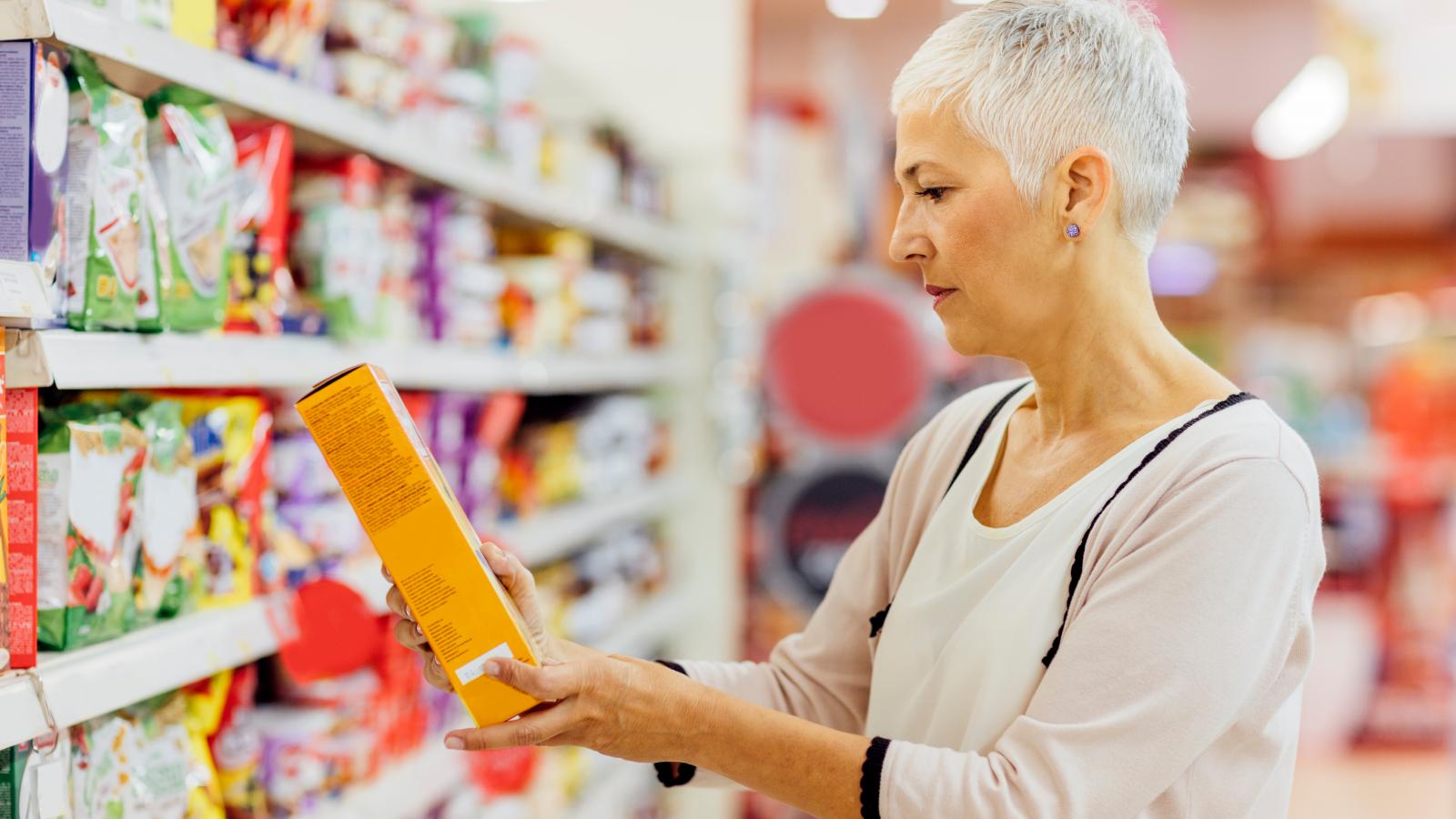 woman reading label food