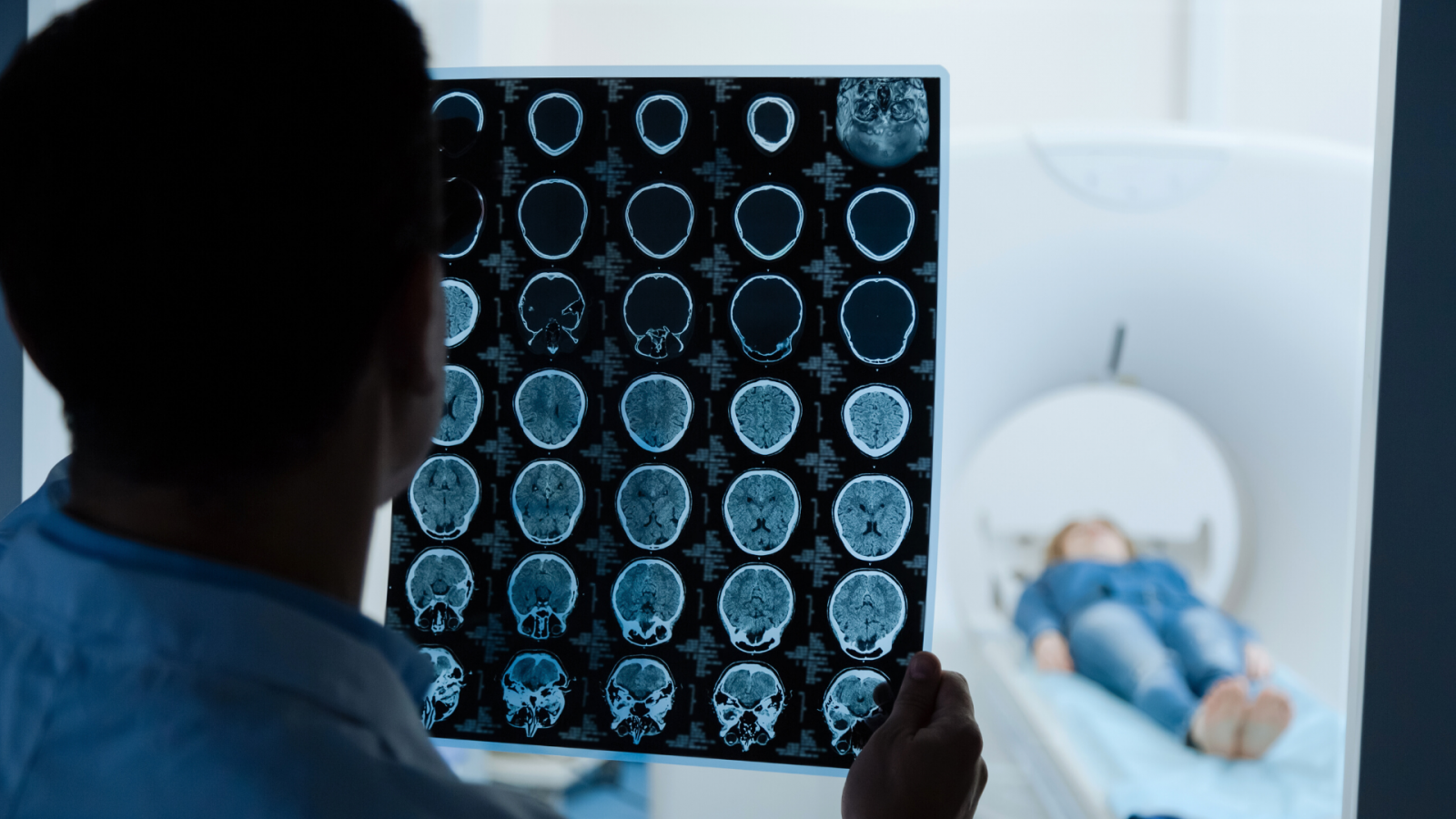 doctor with brain scans