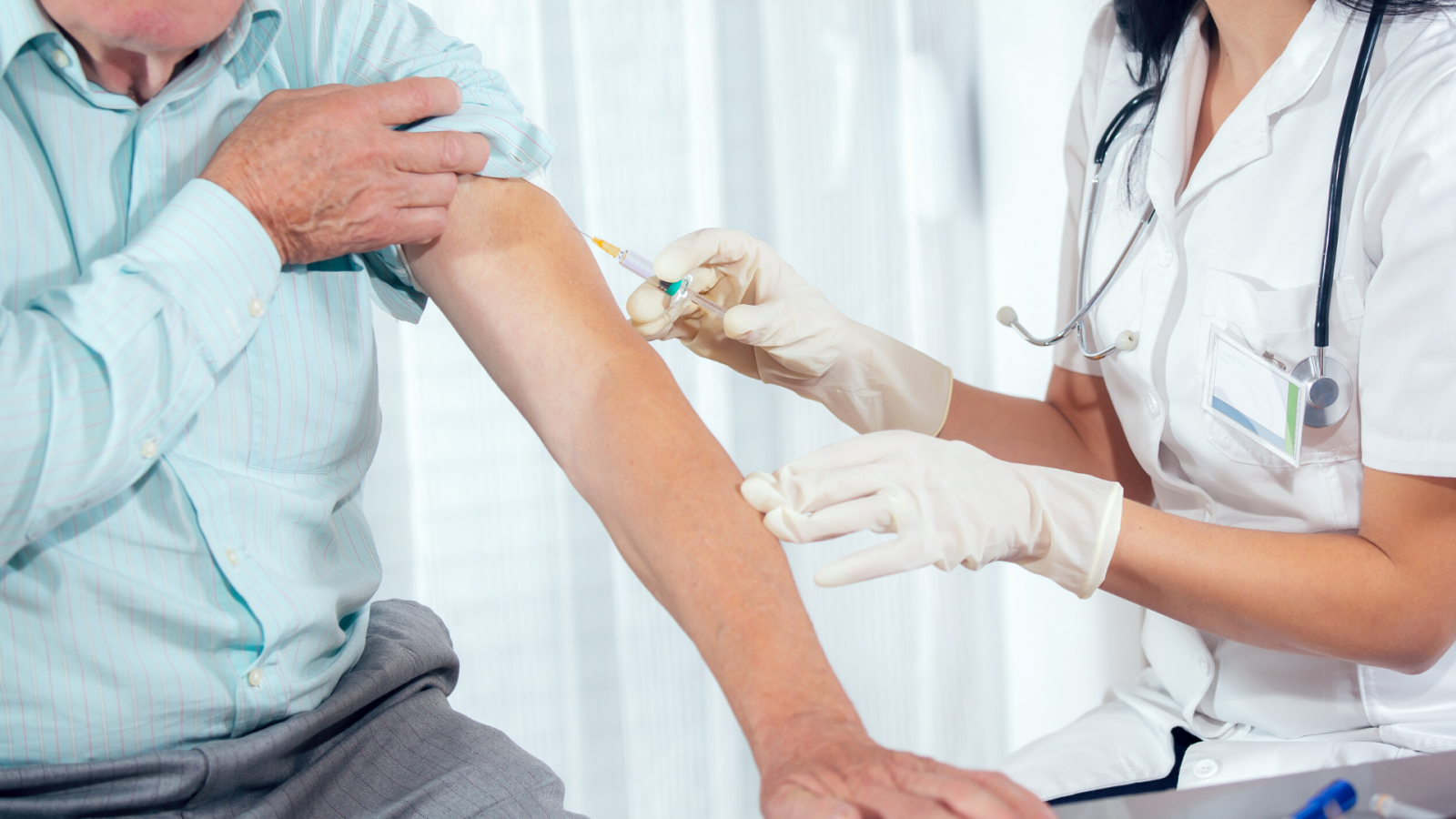 older man getting injection