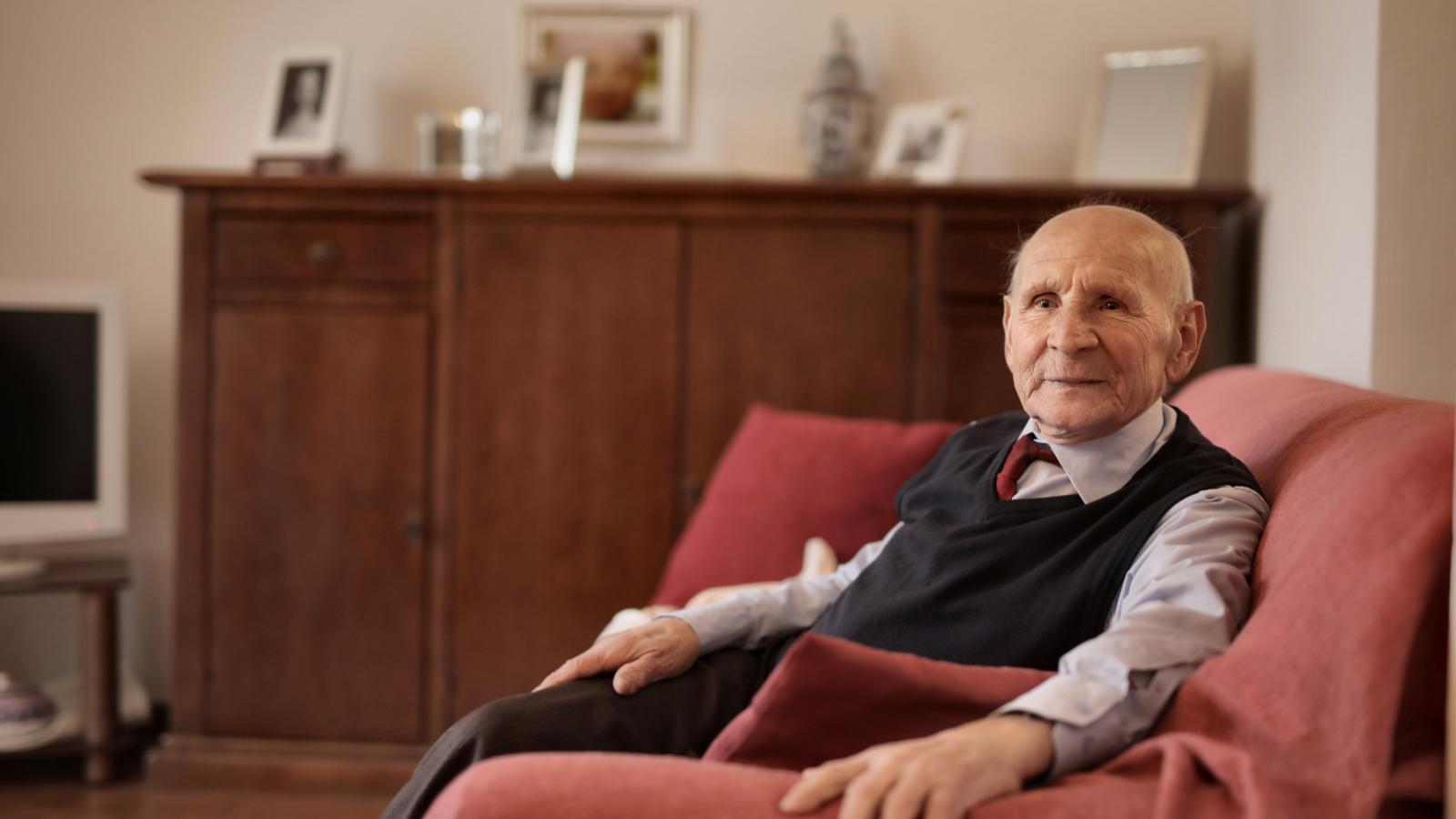elderly man home couch