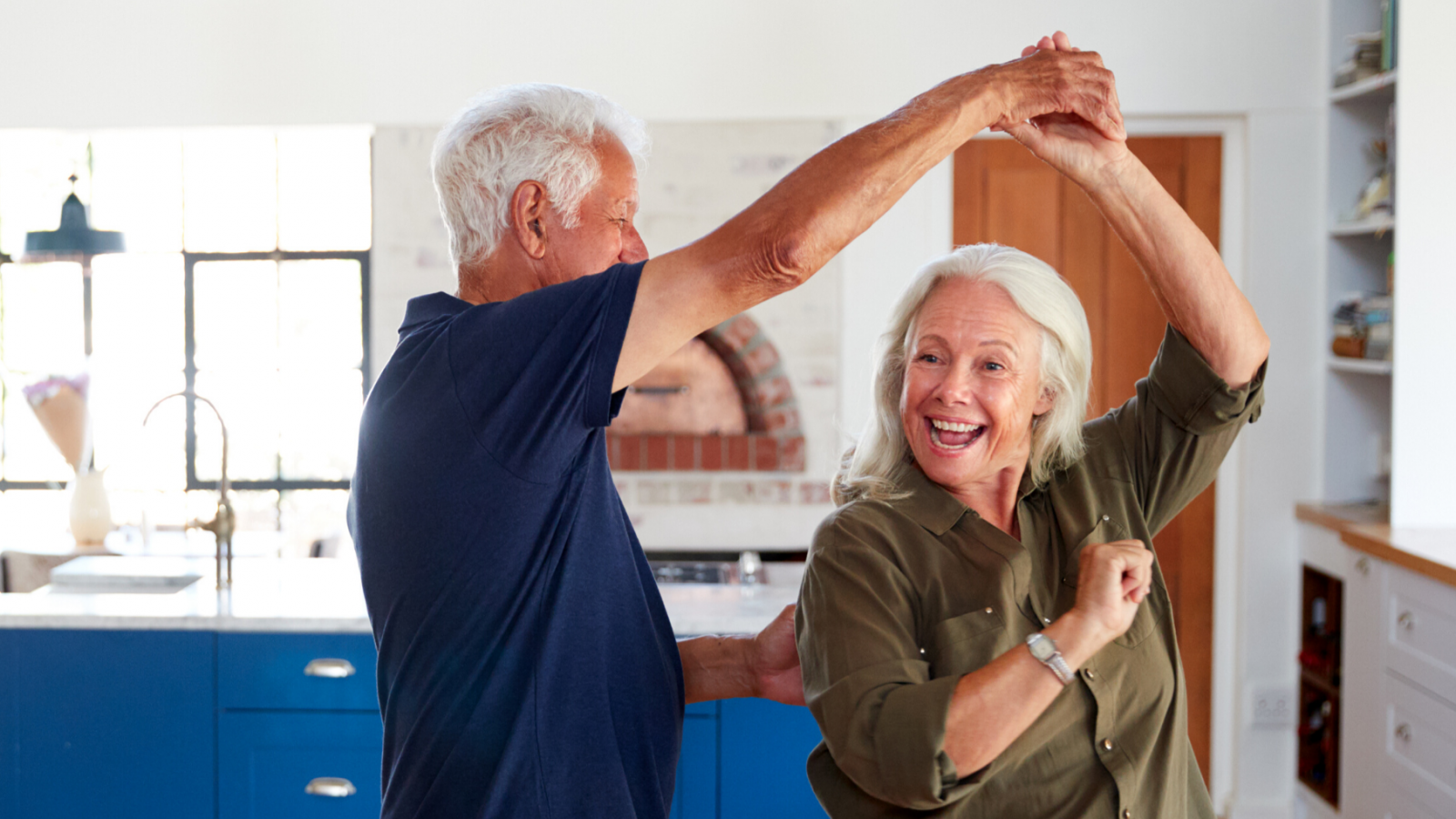 Couple dancing in the kitchen