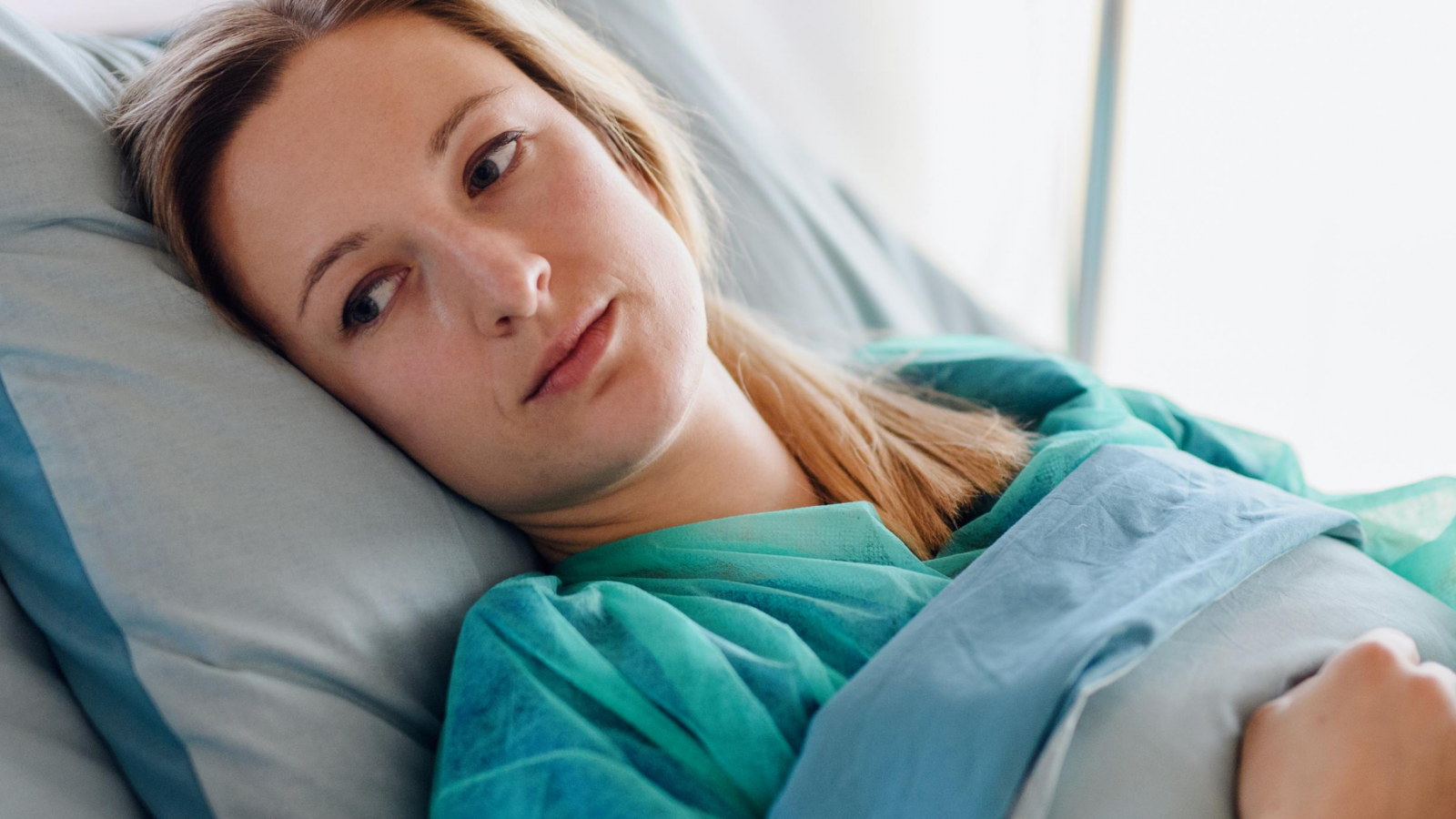 Woman in hospital bed