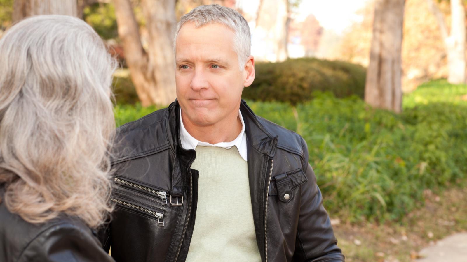A man and woman having a serious conversation