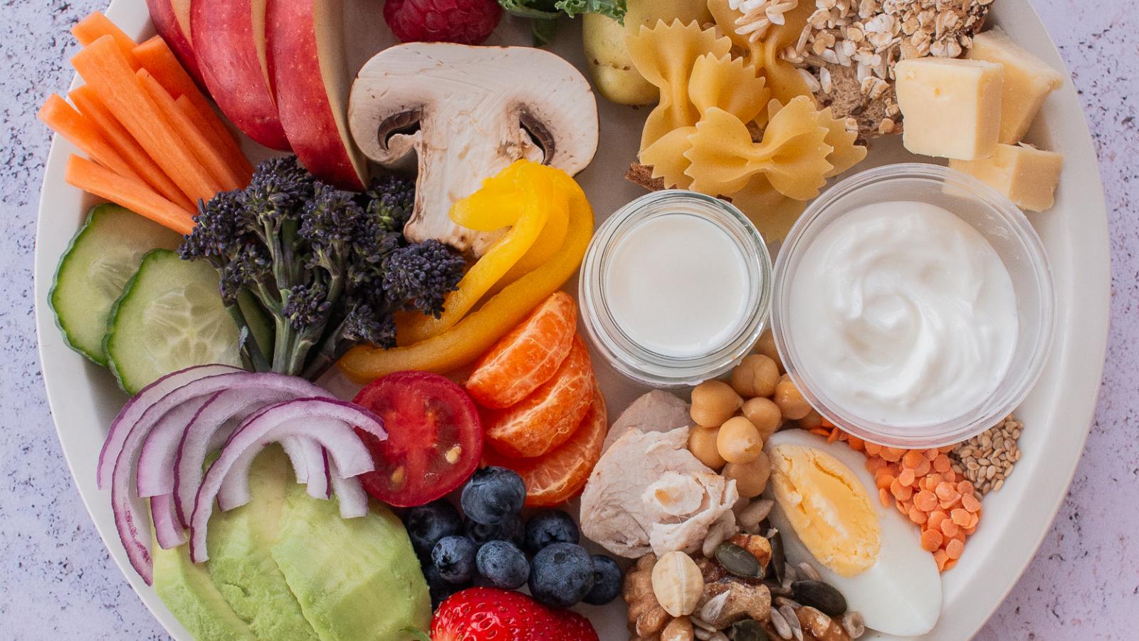 A balanced plate of healthy foods, including proteins, grains, fruits and vegetables